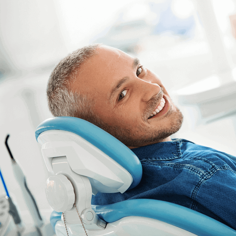 Reclining on a Fort Worth Cosmetic Dentist Chair